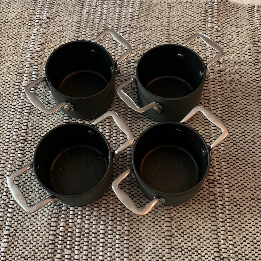 4 Little Cast Iron Pots. Perfect for Soup.